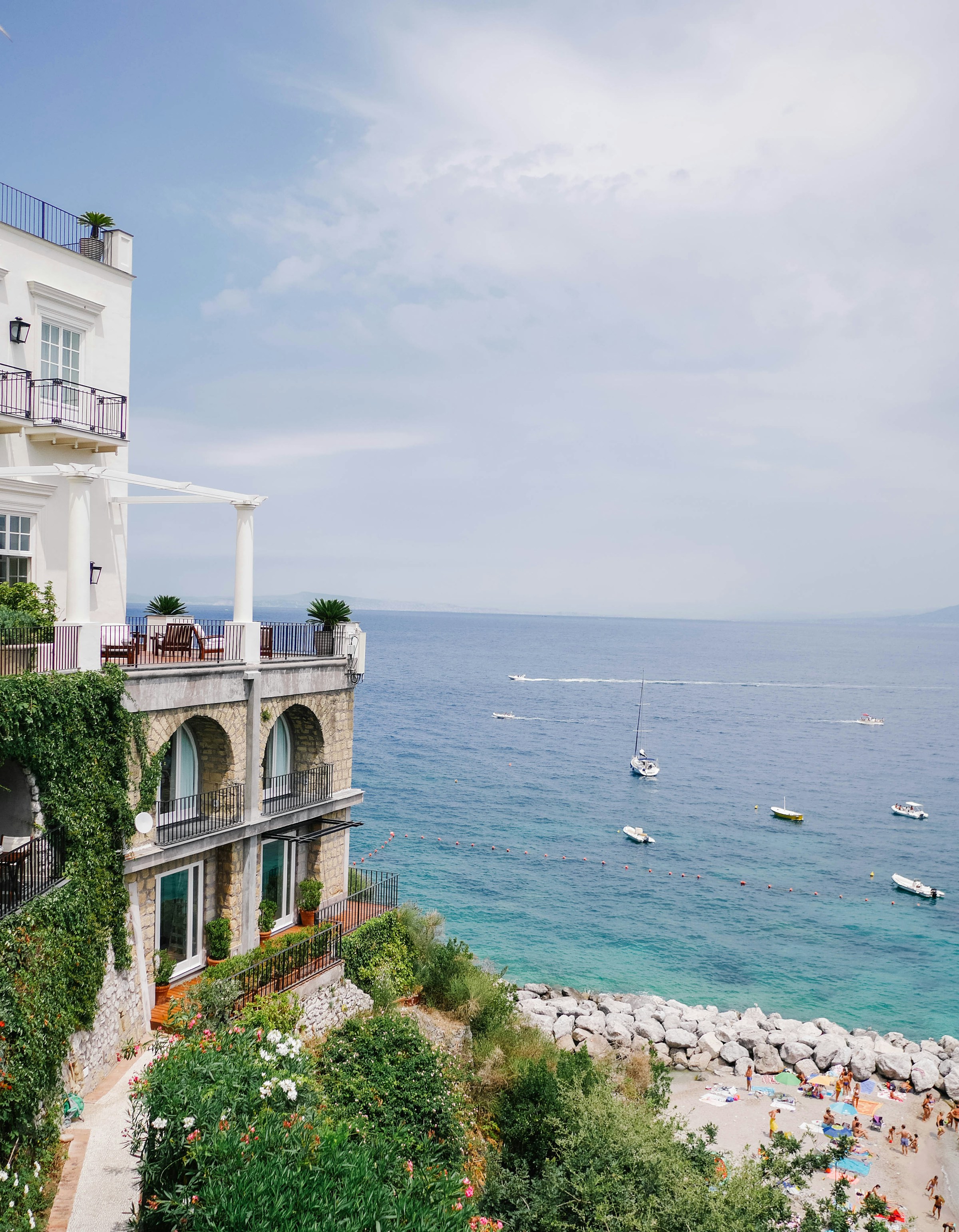 Sunlit villa terrace overlooking the Mediterranean in Capri, Italy